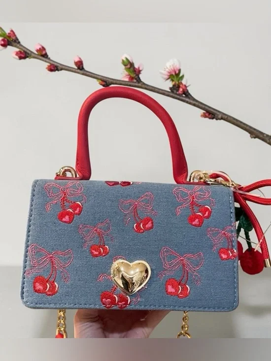 LUV BETSEY BETSEY Johnson denim and cherry Crossbody top Handel bag
NWT - Picture 2 of 13